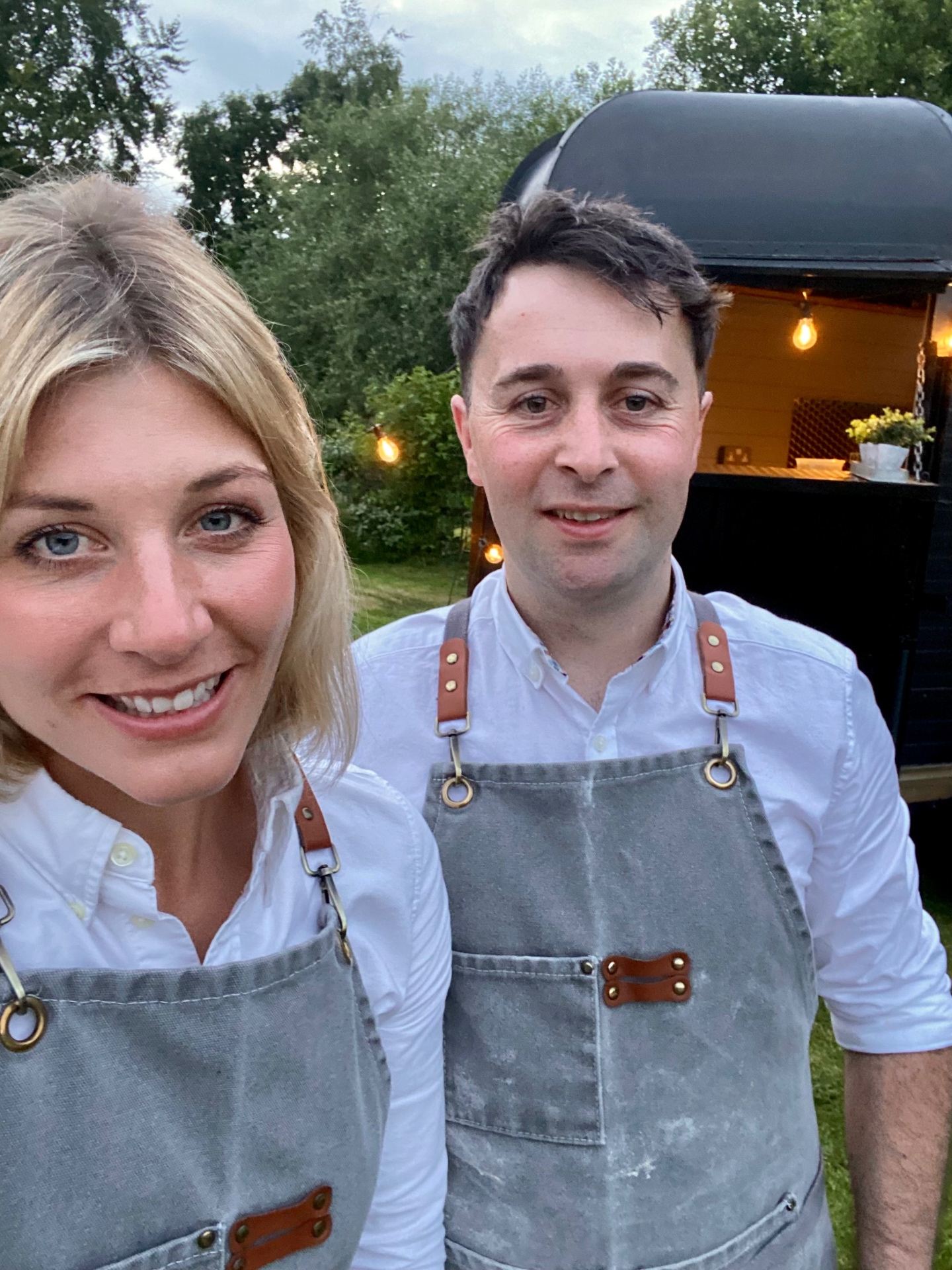 The owners in aprons